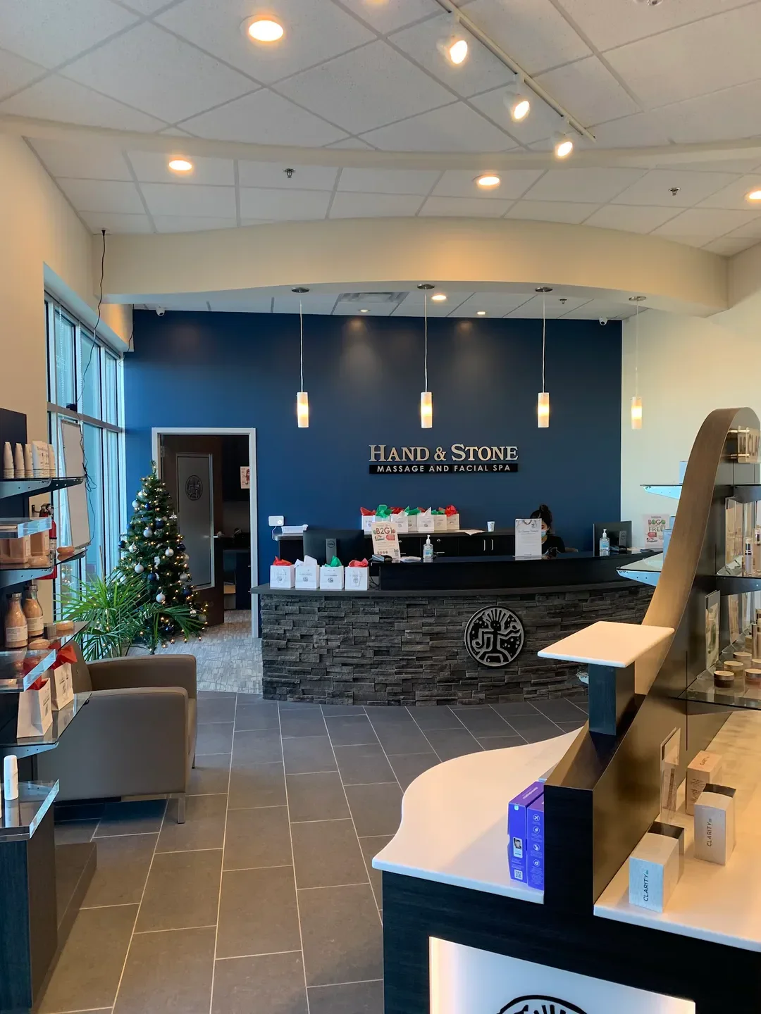 Interior of Spa Walden in Virginia Beach with reception area and product displays.