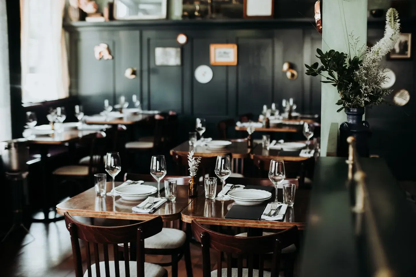 Interior dining at St. Lawrence restaurant in Vancouver, featuring elegant table settings.