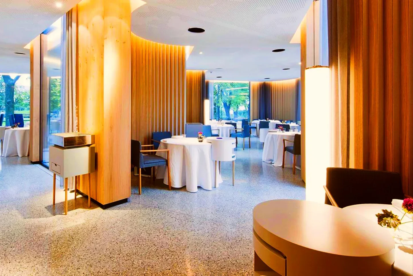 Elegant interior of Steirereck im Stadtpark, a fine dining restaurant in Vienna.