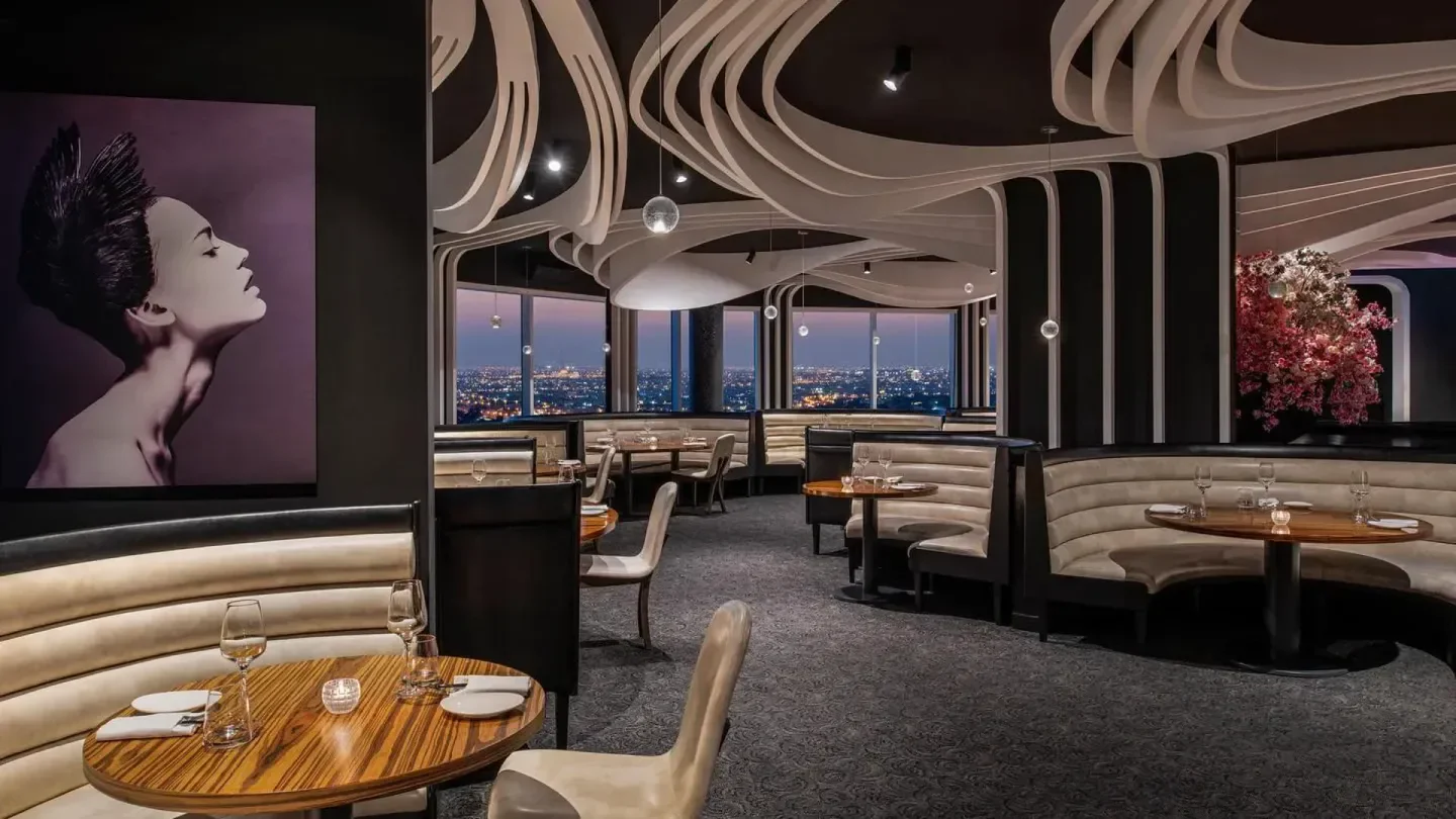 STK Doha restaurant interior with stylish decor, city views, and modern dining ambiance.