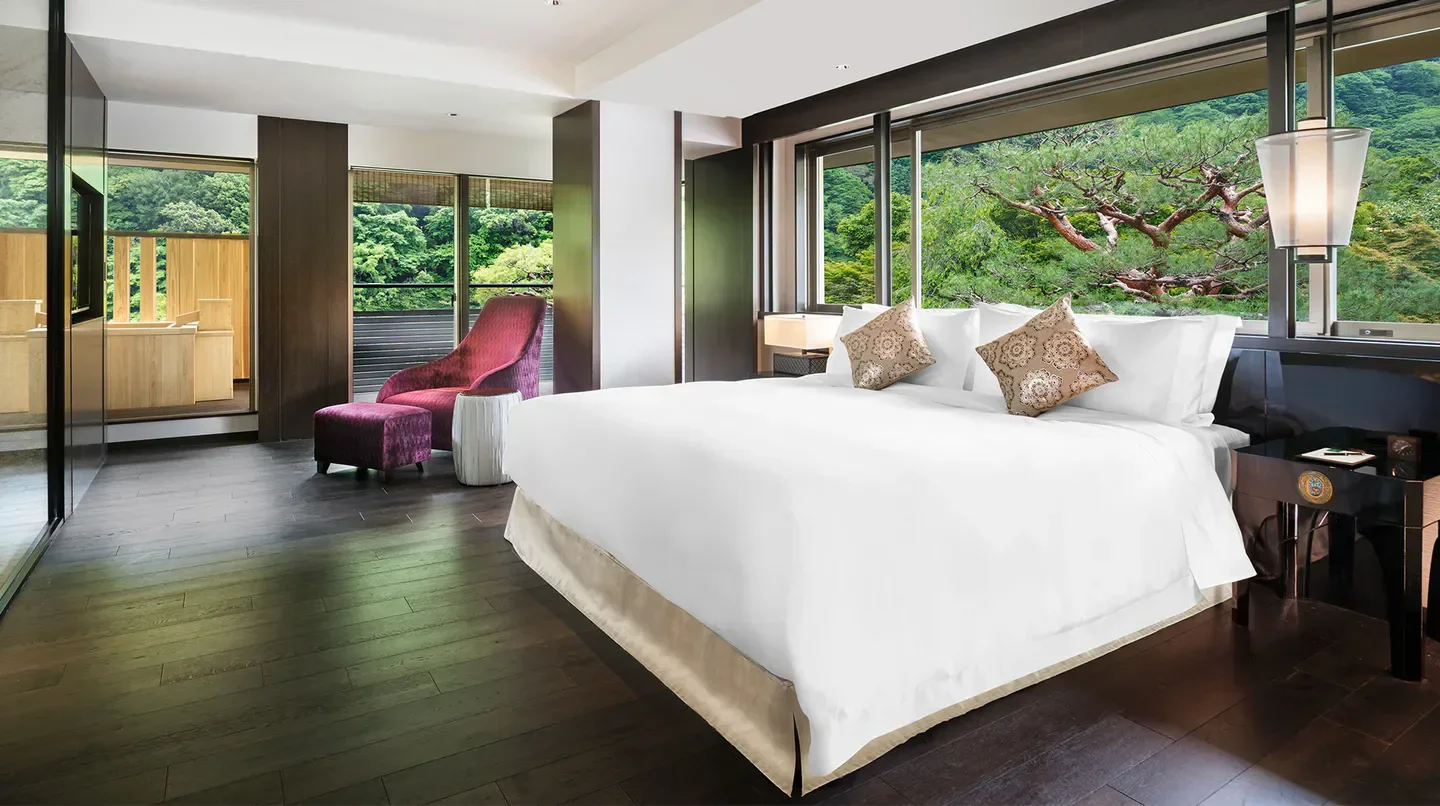Elegant bedroom at Suiran, A Luxury Collection Hotel, Kyoto, with garden views in Kyoto.