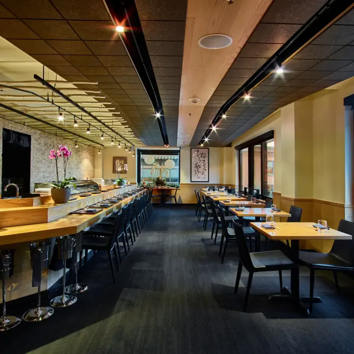Interior view of Sushi Kashiba in Seattle, featuring sushi bar and dining area.