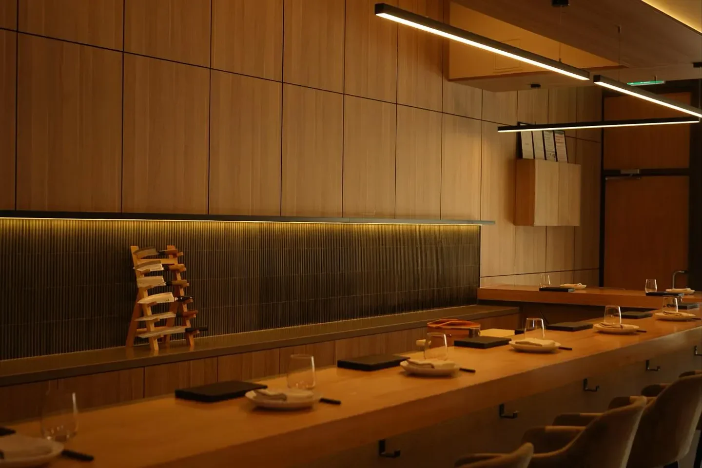 Interior of SUSHI ON in Melbourne, showcasing the minimalist dining space with wooden accents.