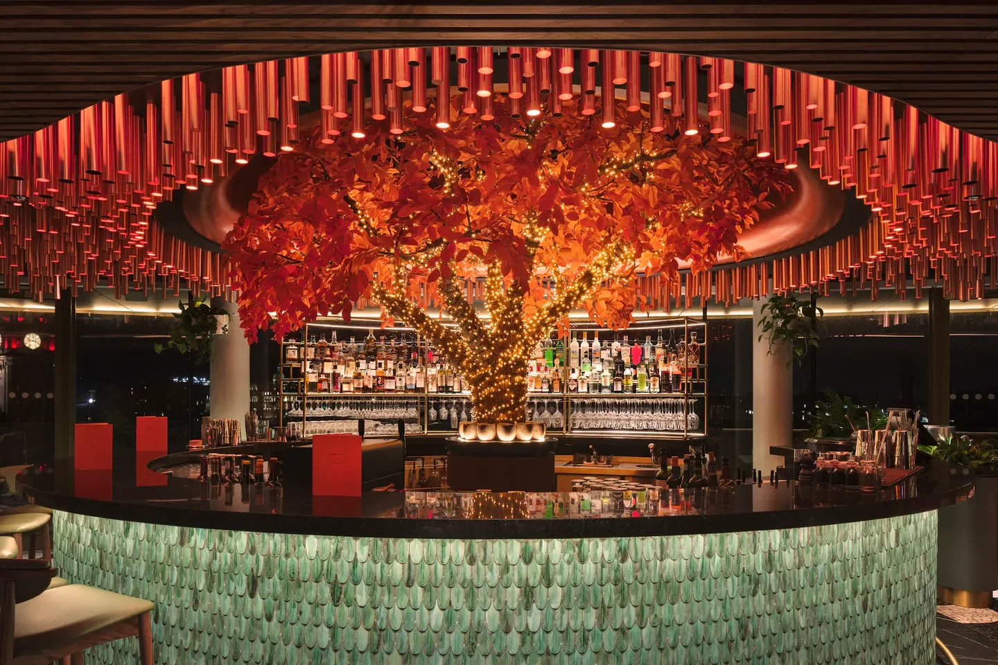 Stunning bar interior at SUSHISAMBA Edinburgh, with a central tree feature in Edinburgh.