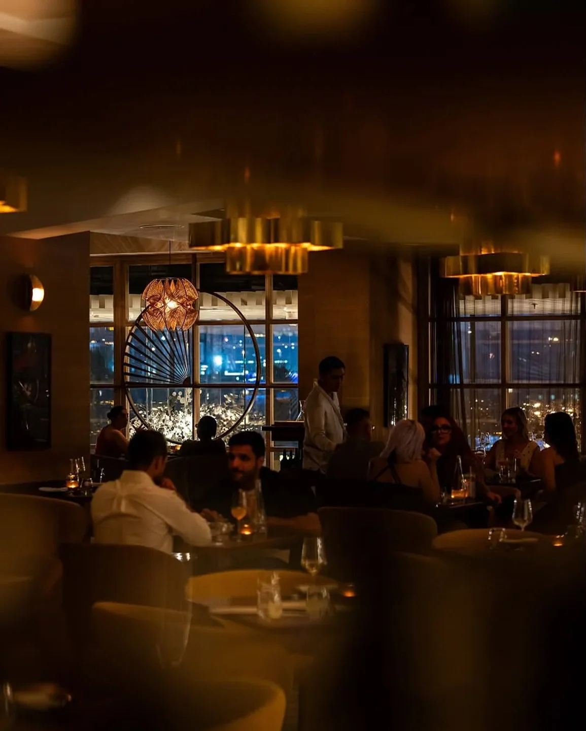 Interior ambiance at Tabu nightclub in Dubai, featuring ambient lighting and social gatherings.