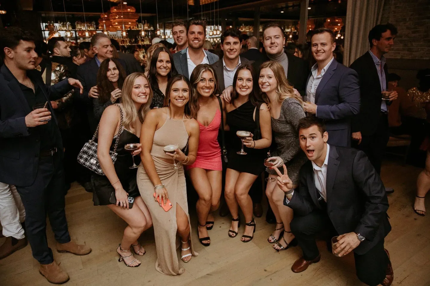 Group of friends enjoying drinks at Tagliata restaurant in Baltimore, Maryland