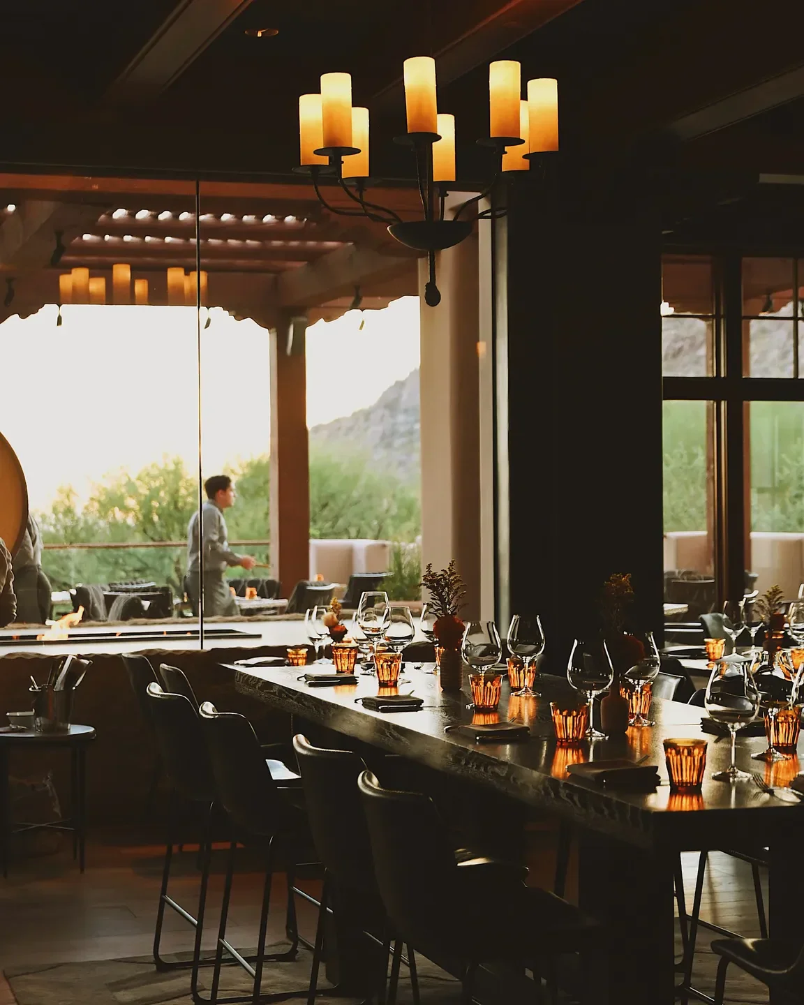 Interior dining at Talavera restaurant in Phoenix, featuring elegant table settings and lighting.