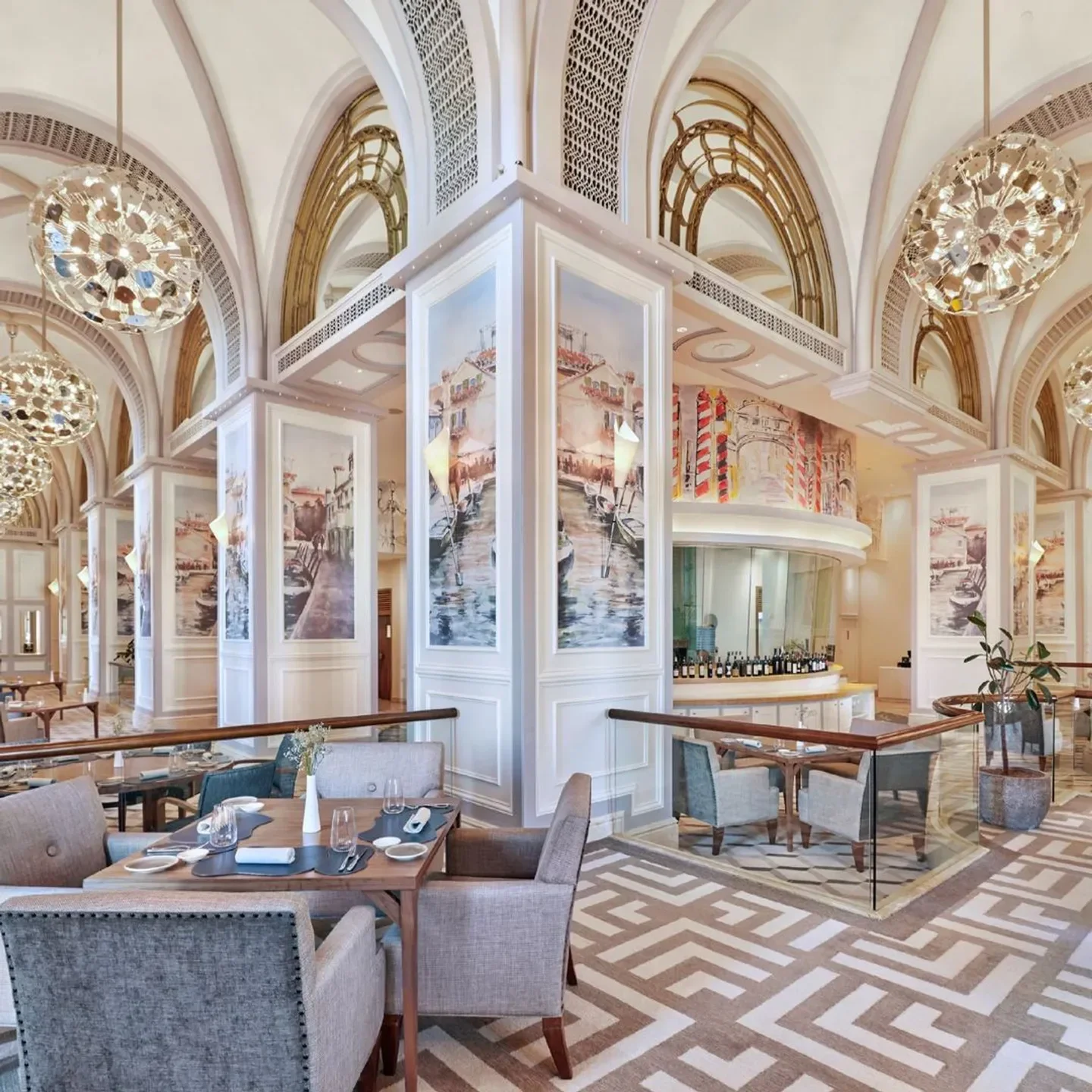 Elegant interior of Talea restaurant in Abu Dhabi, with stylish decor and Venetian artwork