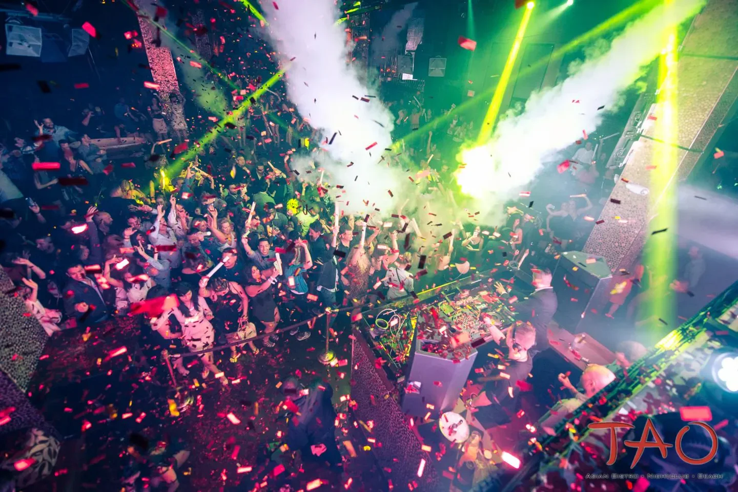 Tao Nightclub in Las Vegas, party atmosphere with confetti and vibrant lights.