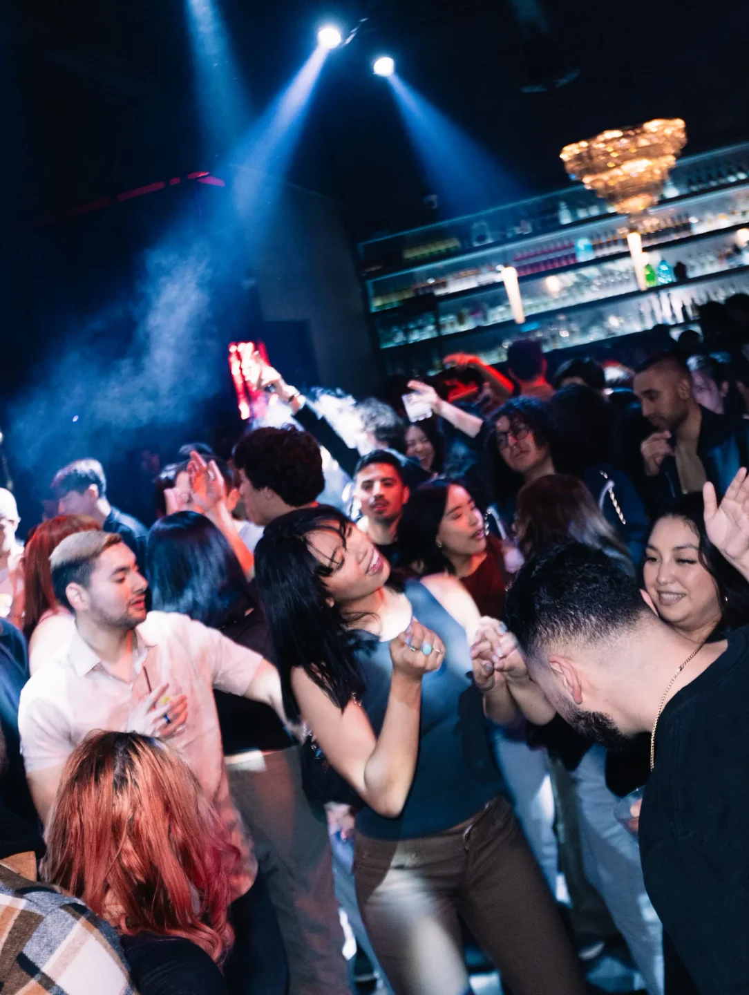 Energetic crowd dancing at Terra Cotta nightclub in Los Angeles with vibrant lighting and a lively atmosphere.