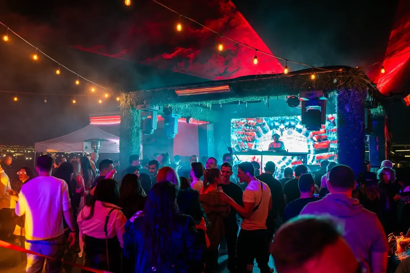 Terrace Afterhours nightclub in Las Vegas with DJ, lights, and dancing crowd.
