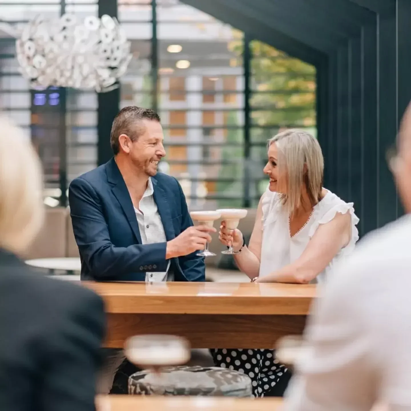 Couple enjoying cocktails at Terrace Kitchen in Launceston, a perfect dining experience.