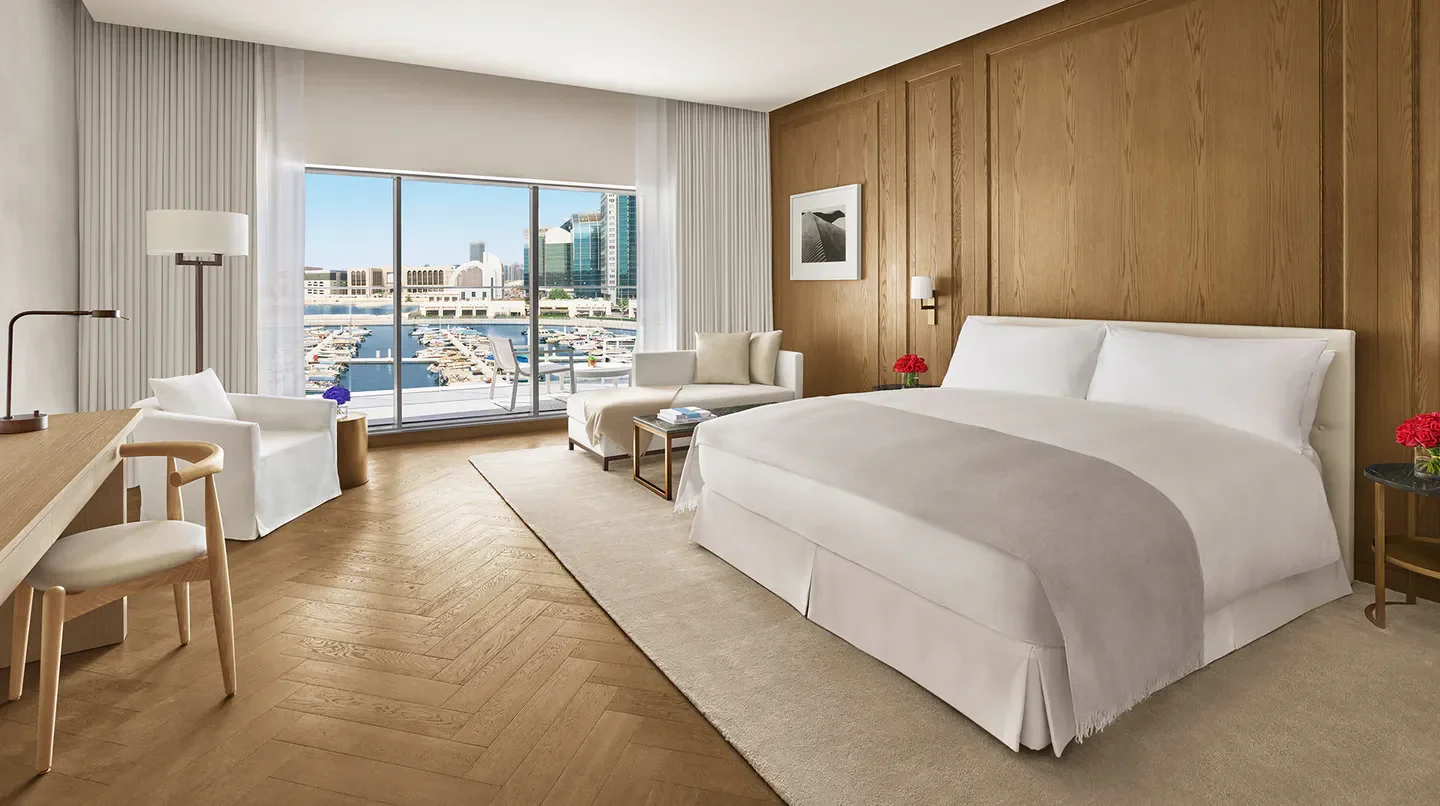 Luxury bedroom at The Abu Dhabi EDITION, featuring waterfront views in Abu Dhabi.