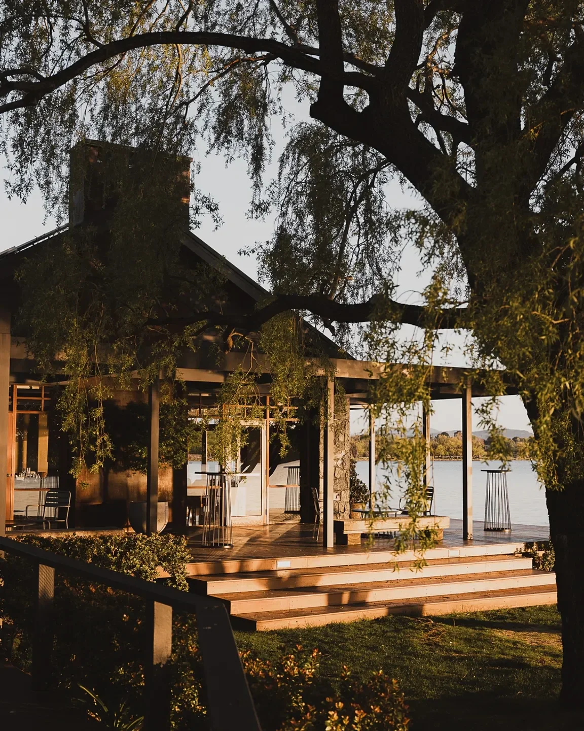 The Boat House restaurant in Canberra, Australia, with a waterside dining view.