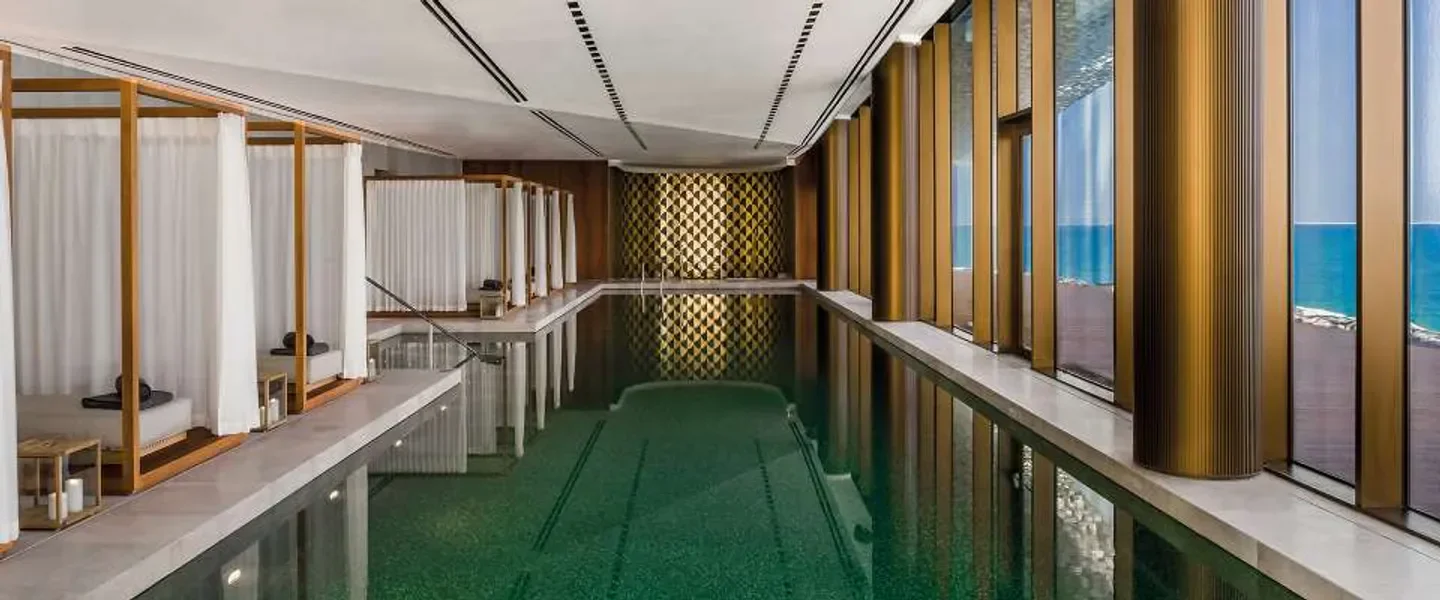 Interior pool at The Bvlgari Spa Dubai, with sea views in Dubai.