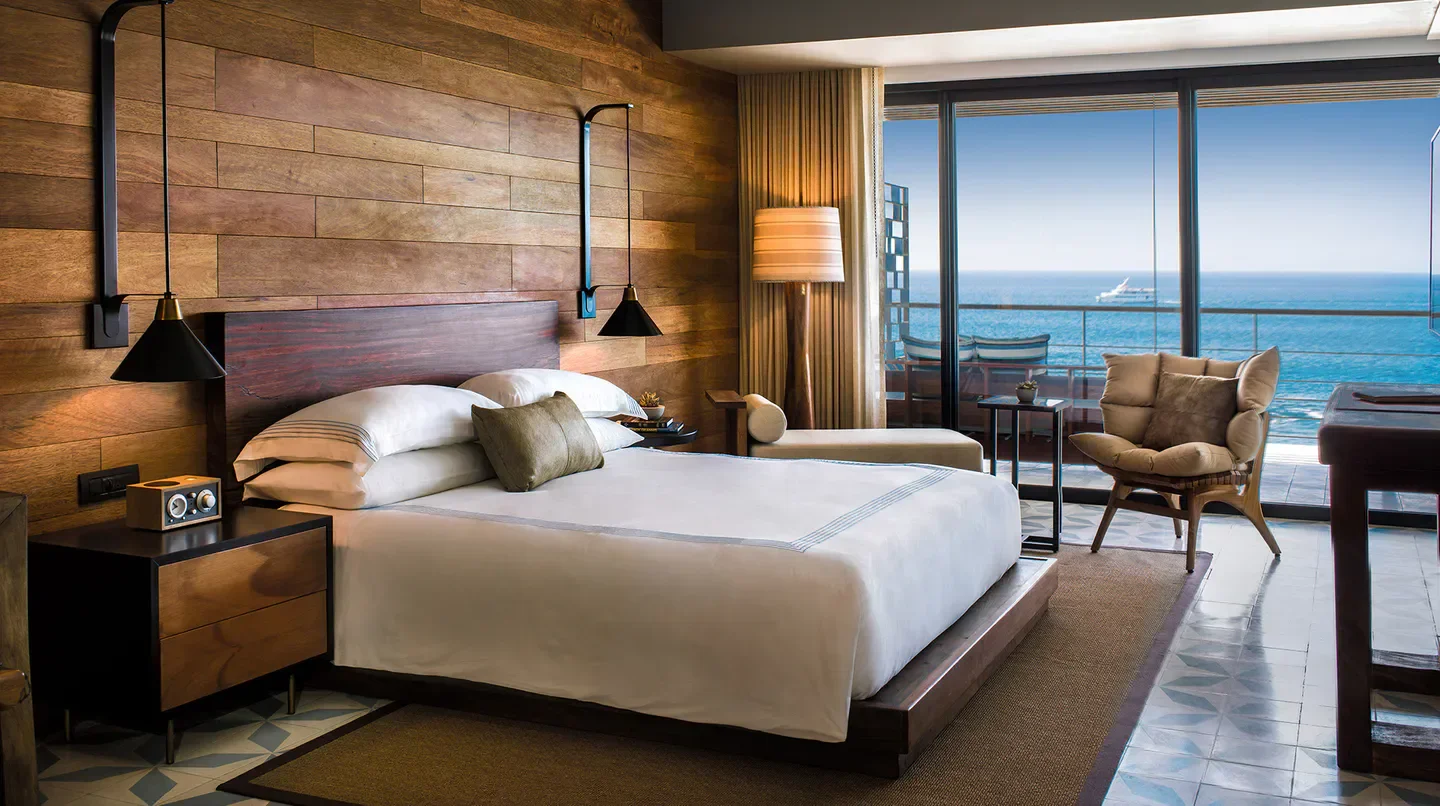 Bedroom with ocean view at The Cape, A Thompson Hotel in Cabo San Lucas, Mexico.