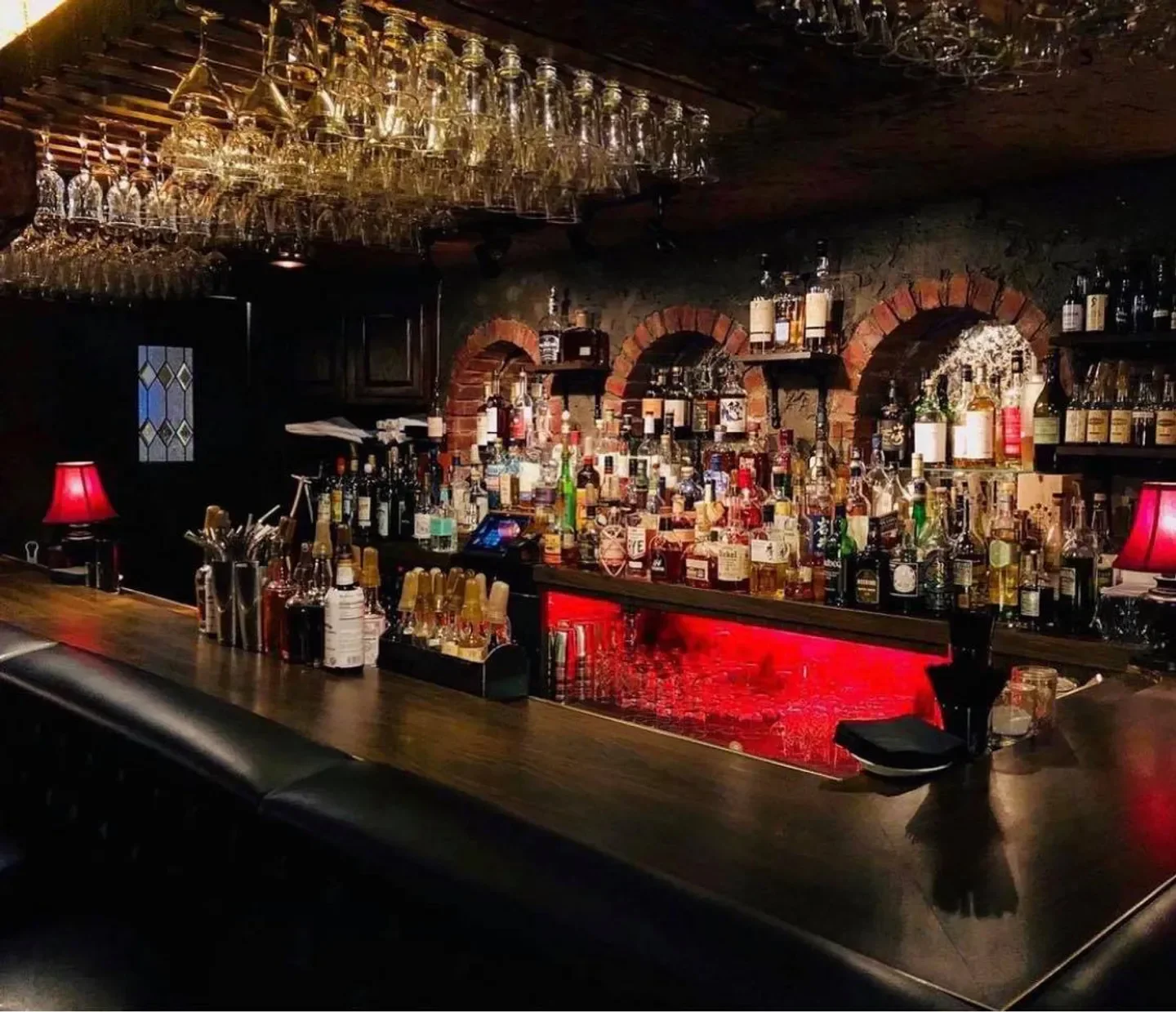 Interior bar at The Cellar Restaurant in Orange County, with a wide selection of liquor