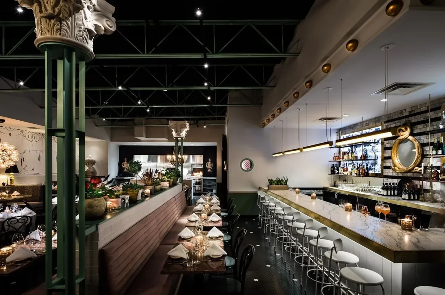 Interior of The Charles restaurant in Dallas, featuring a stylish bar and dining area.