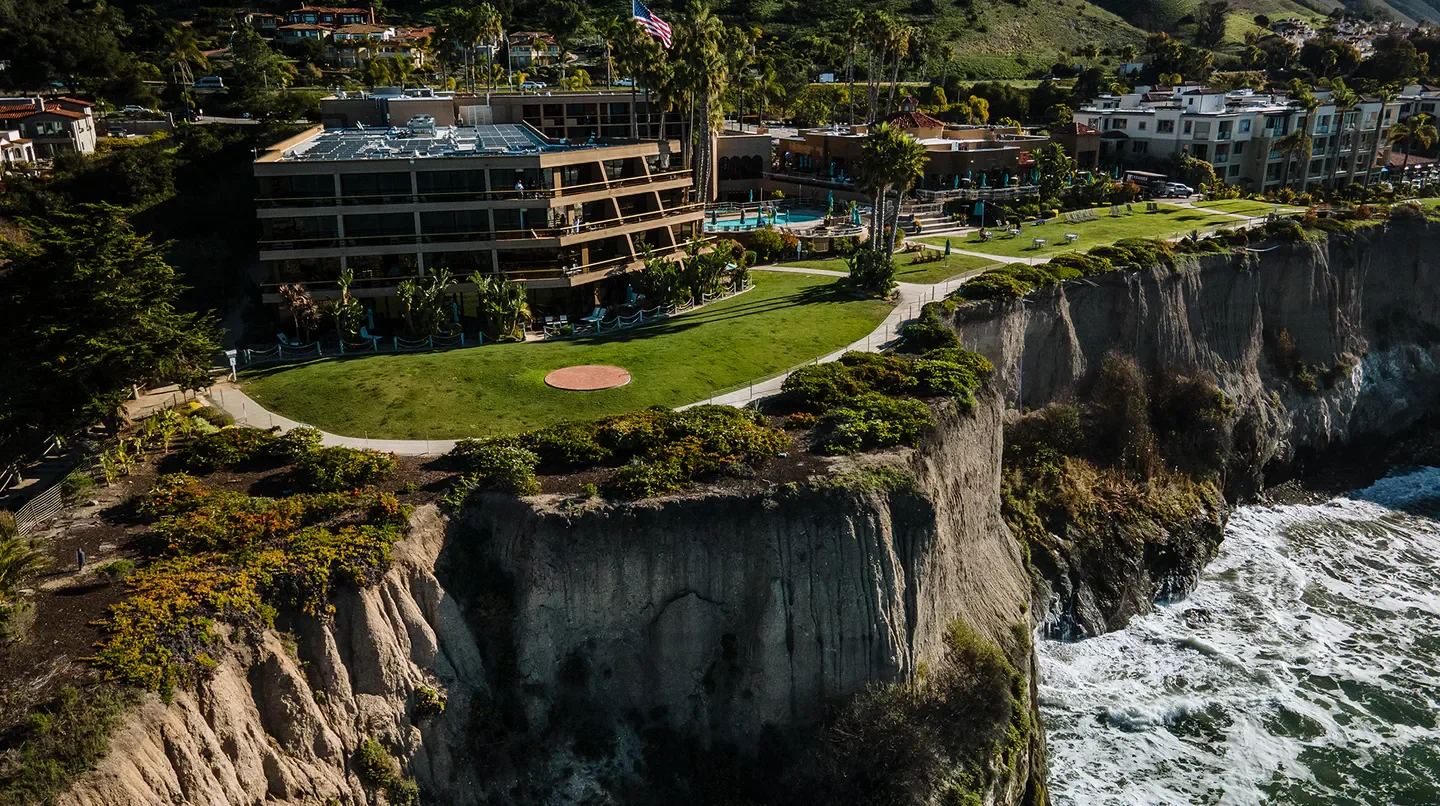 Aerial view of The Cliffs Hotel and Spa in Monterey, California, on the ocean cliffs.