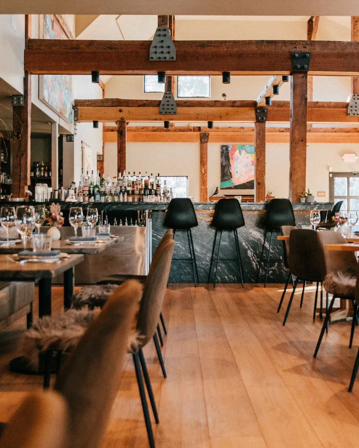 Interior of The Dixboro Project restaurant in Ann Arbor, featuring bar and dining area