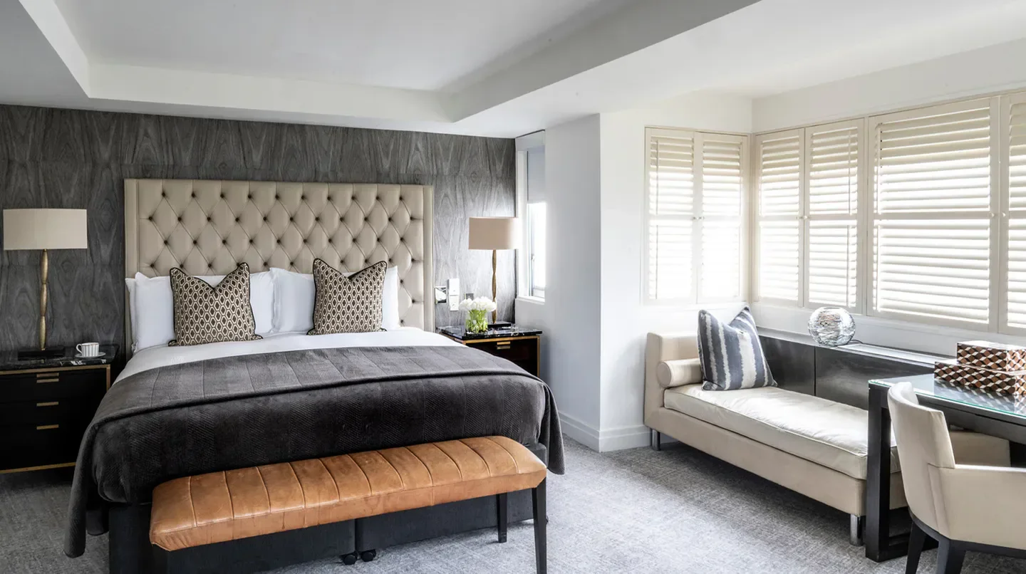 Elegant bedroom at The Dupont Circle hotel in Washington, featuring a plush bed.