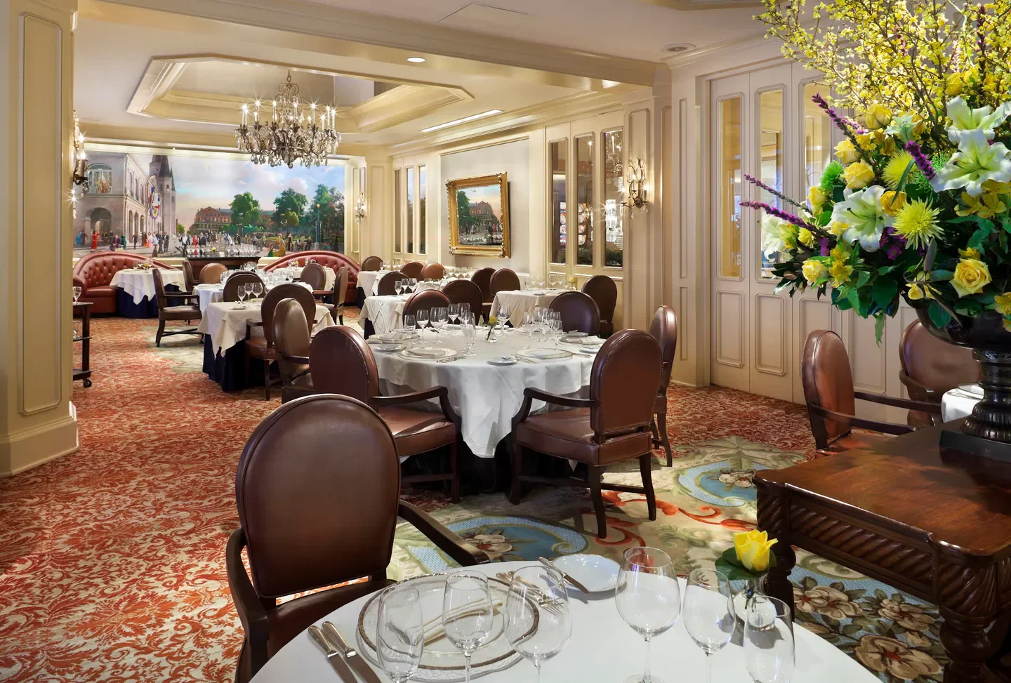 Elegant dining room interior at The Grill Room in New Orleans, with fine dining tables