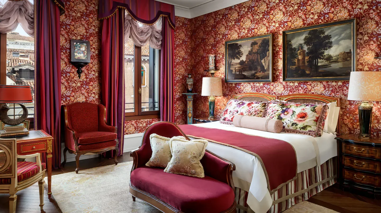 Elegant bedroom at The Gritti Palace, A Luxury Collection Hotel, Venice, with city view.