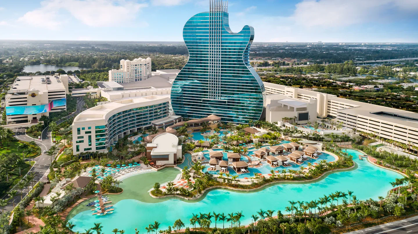 Aerial view of The Guitar Hotel in Fort Lauderdale, with a large pool area.