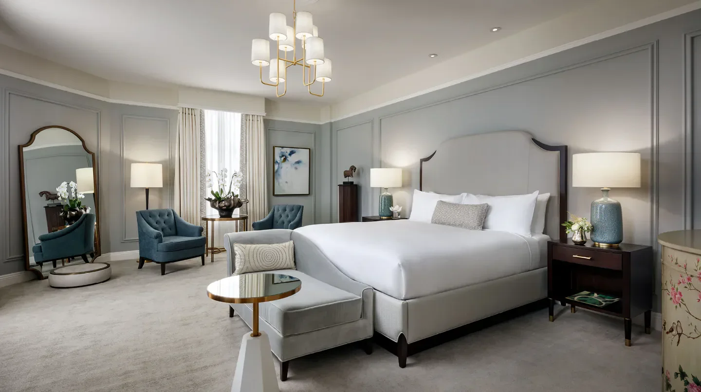 Elegant bedroom at The Hermitage Hotel in Nashville, featuring a luxurious design.