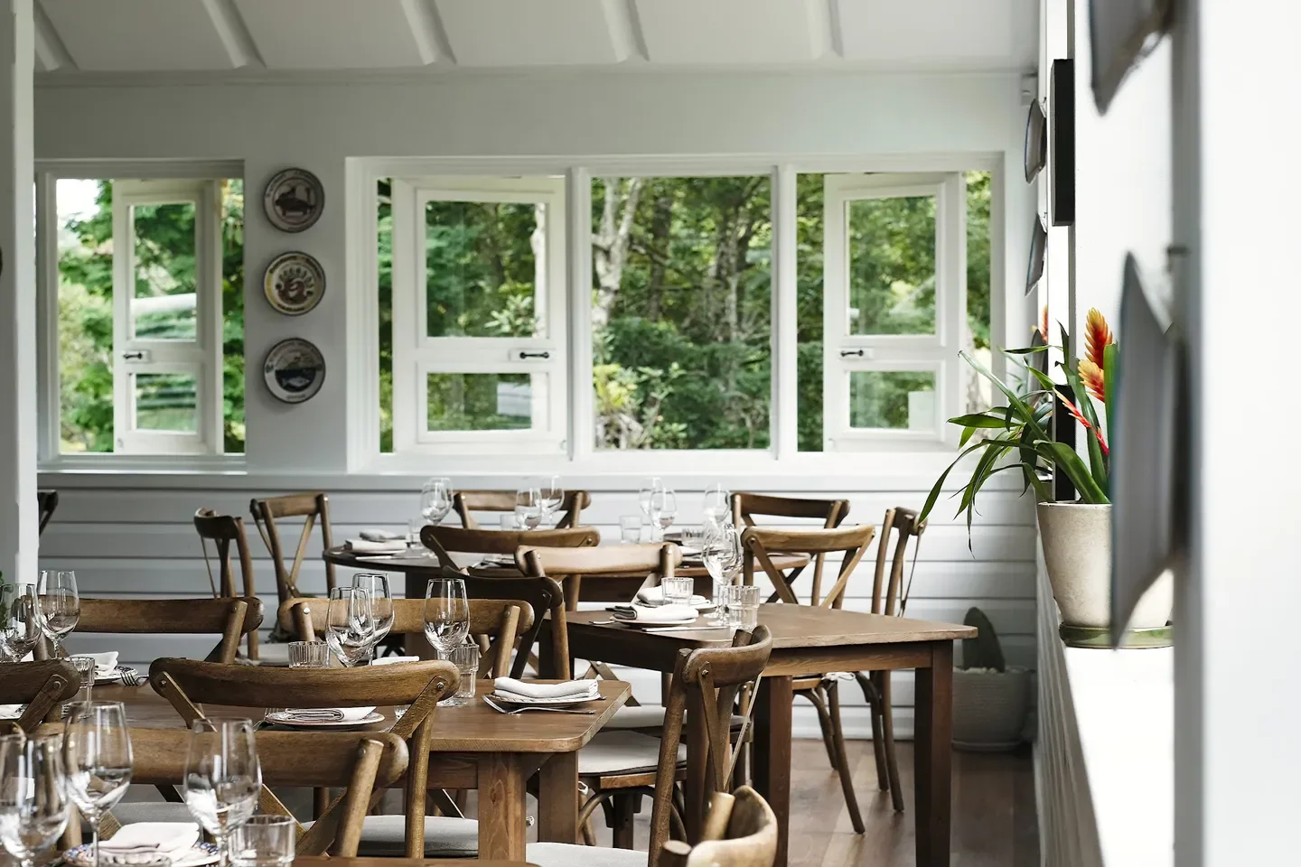Elegant dining area at The Hut Byron Bay restaurant in Byron Bay, with inviting decor.