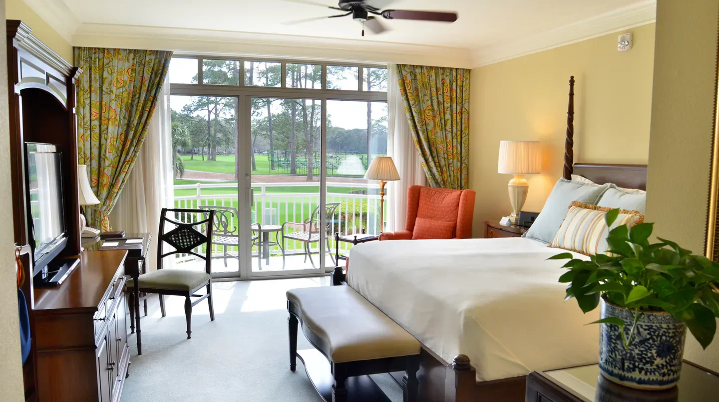 Spacious bedroom at The Inn & Club at Harbour Town with golf course views in Hilton Head Island