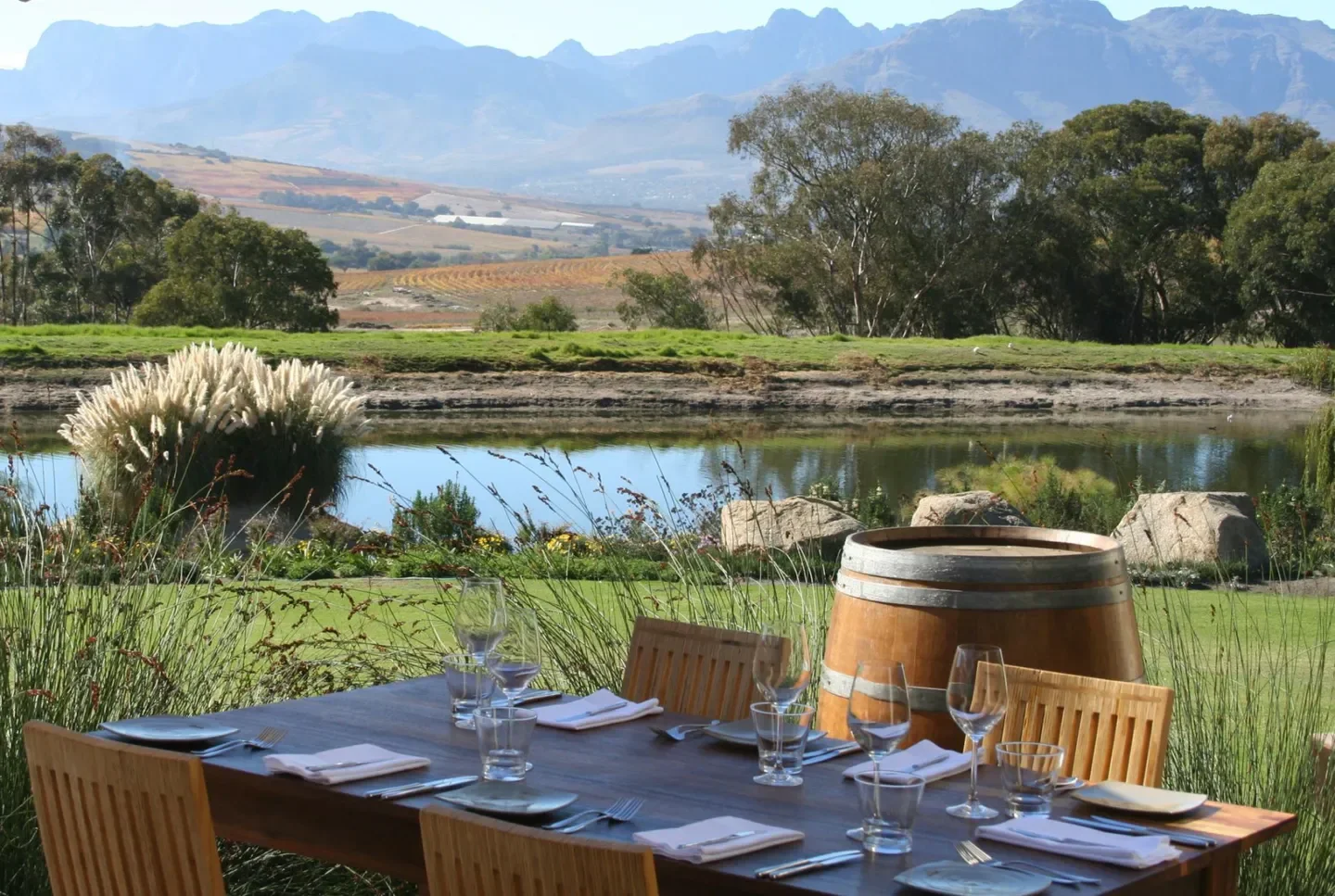 Outdoor dining at The Jordan Restaurant with George Jardine in Stellenbosch with mountain views.