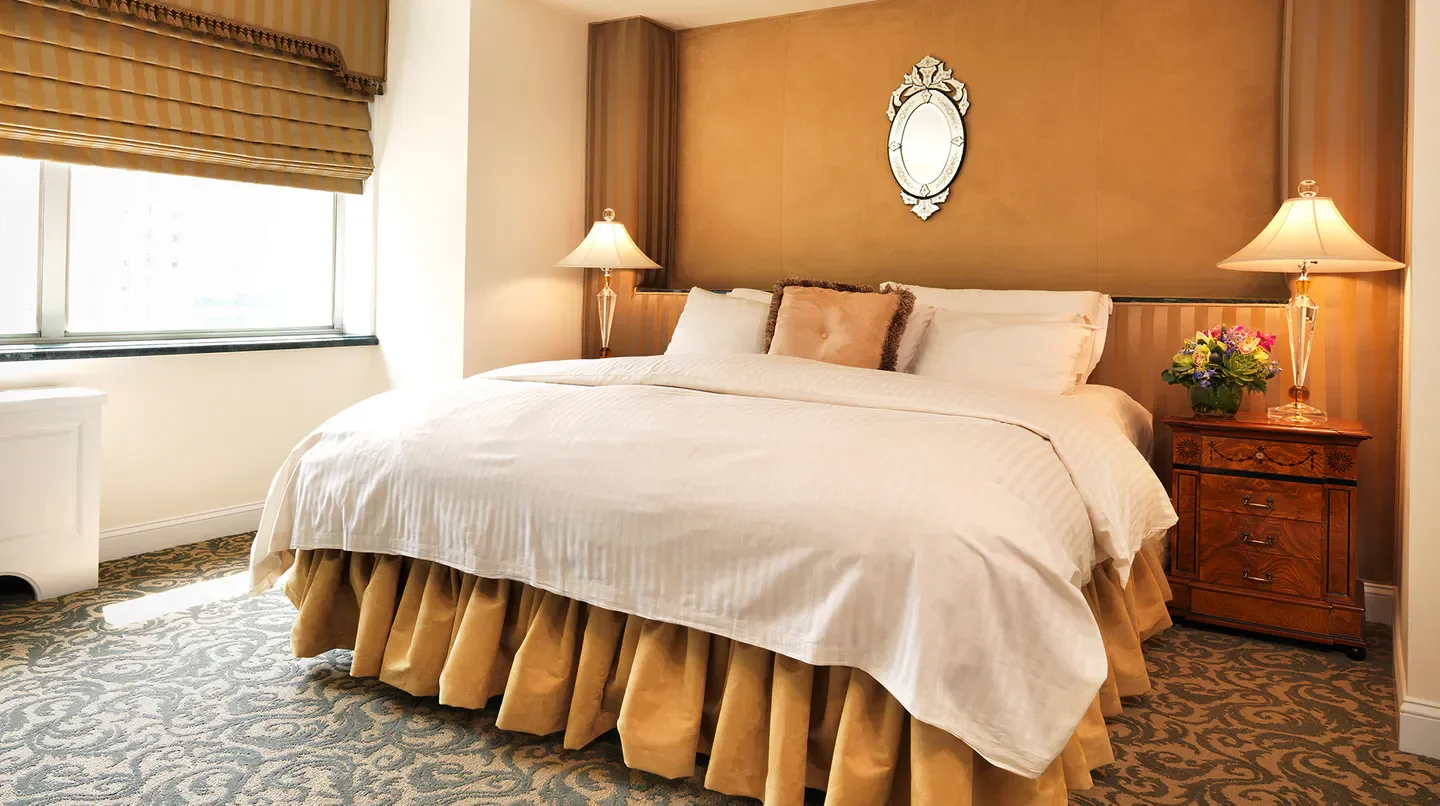 Cozy bedroom at The Kimberly Hotel in New York City with elegant decor and design