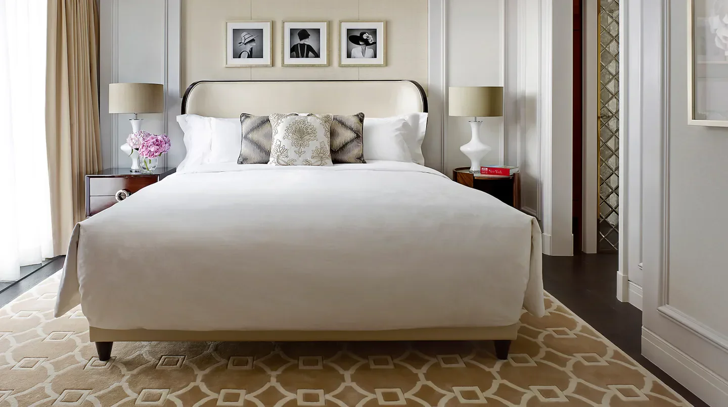 Elegant bedroom at The Langham, Hong Kong with a luxurious bed, in Hong Kong.