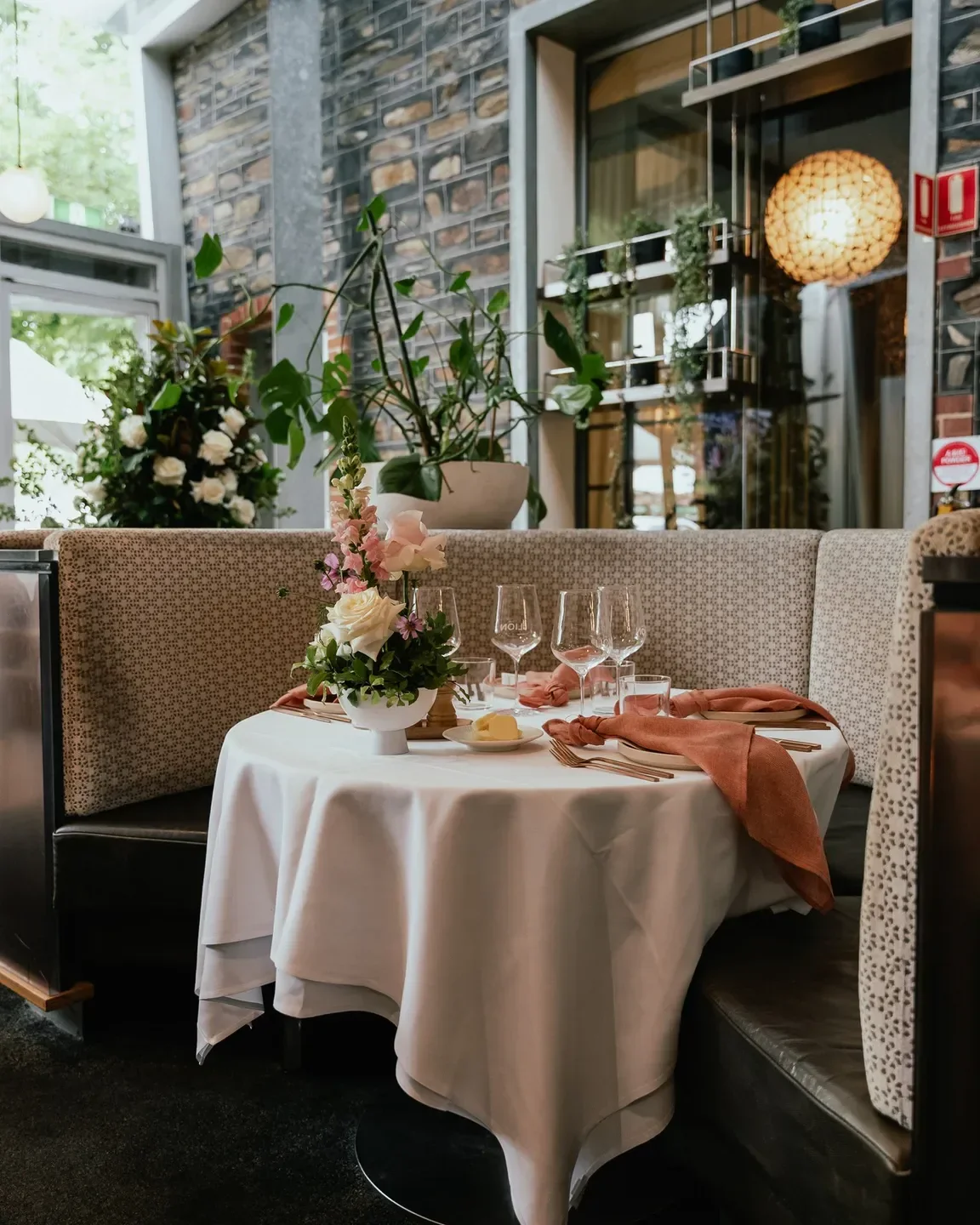 Elegant dining table at The Lion Hotel in Adelaide, set for a special occasion.
