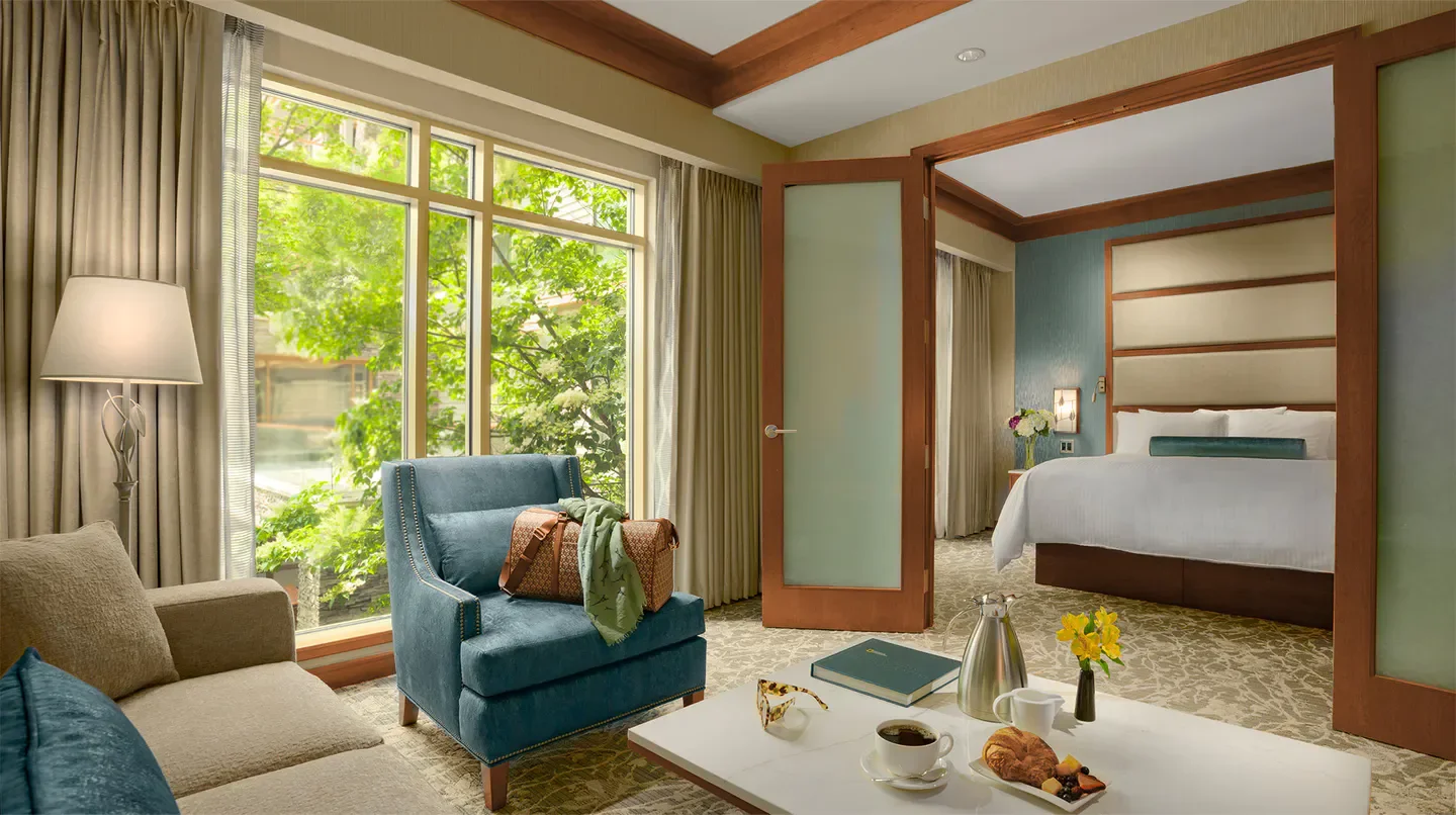 Cozy hotel room at The Lodge at Turning Stone Resort Casino in Saratoga with breakfast.