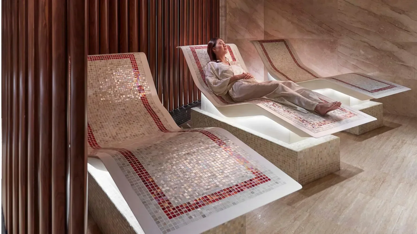 Relaxing spa experience at The Mandarin Spa in Hong Kong, featuring tiled lounge chairs