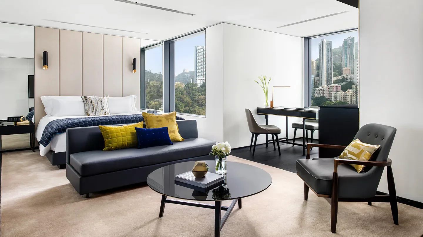 Modern hotel room at The Murray, Hong Kong, with stunning city views of Hong Kong.