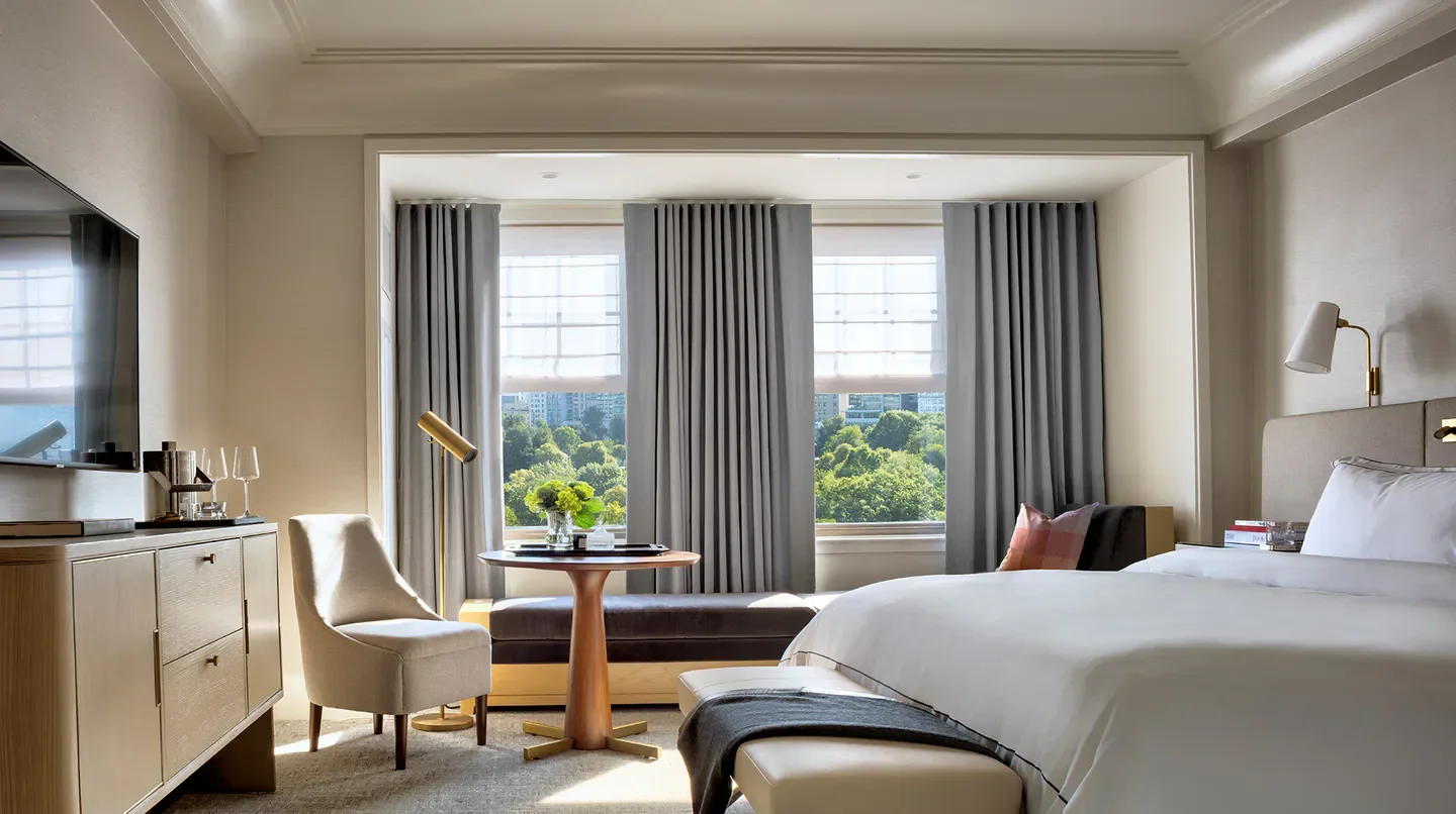 Elegant hotel room at The Newbury Boston with city views of Boston.