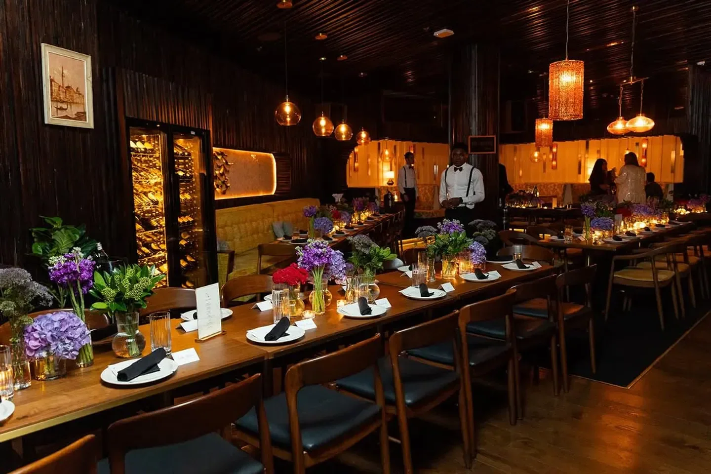 Interior of The Nice Guy in Los Angeles with table settings and flowers.