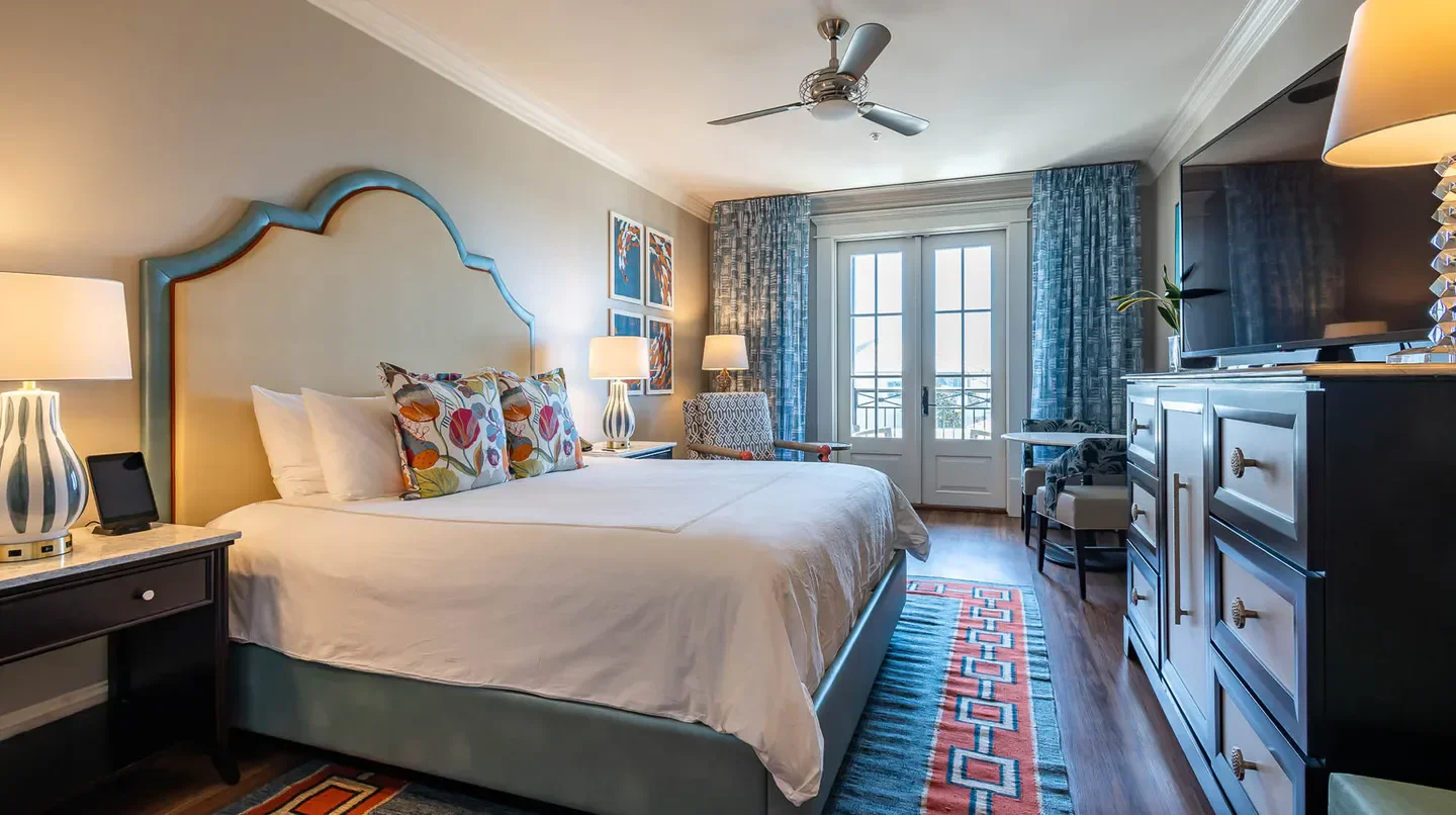 Elegant bedroom at The Pearl Hotel in Tampa, Florida, featuring stylish decor and design.