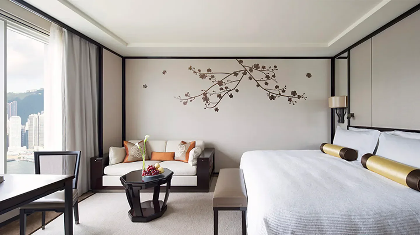 Elegant hotel room at The Peninsula Hong Kong, featuring city views of Hong Kong.