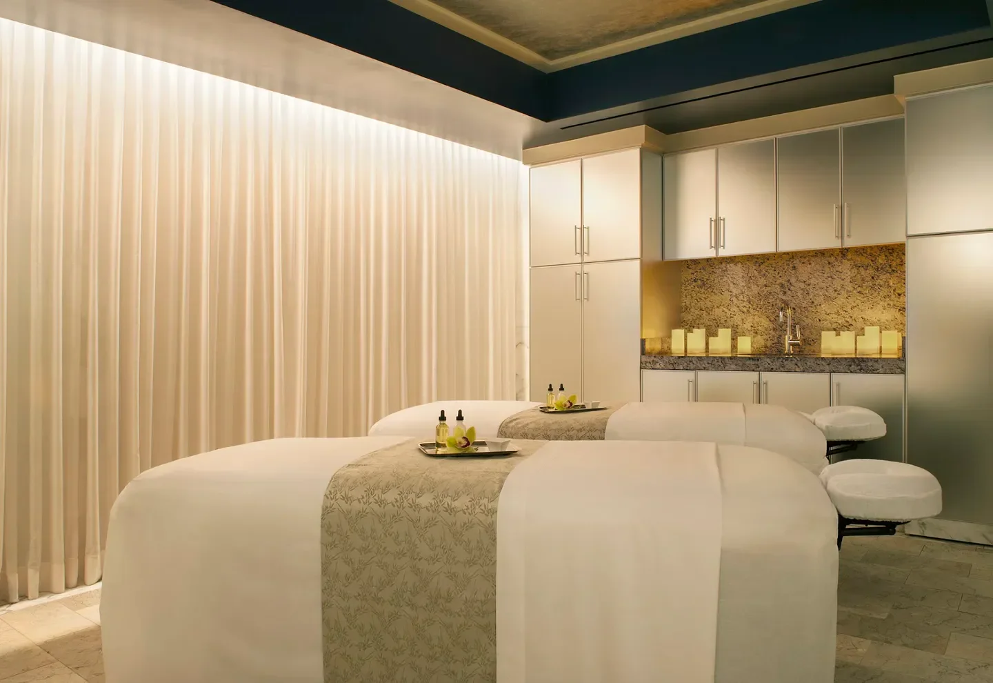 Relaxing spa treatment room at The Peninsula Spa Beverly Hills in Los Angeles.
