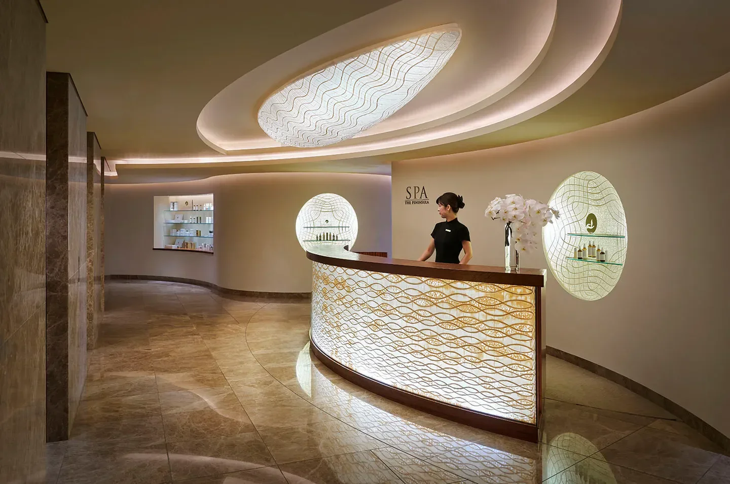 Reception area at The Peninsula Spa Tokyo, featuring a modern design in Tokyo, Japan.