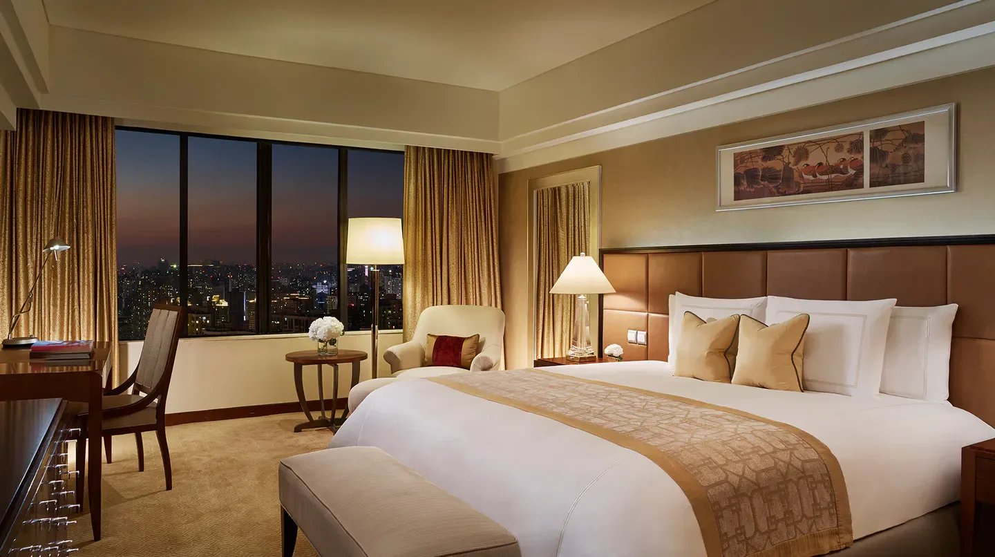 Elegant hotel room at The Portman Ritz-Carlton, Shanghai, with city view in Shanghai.