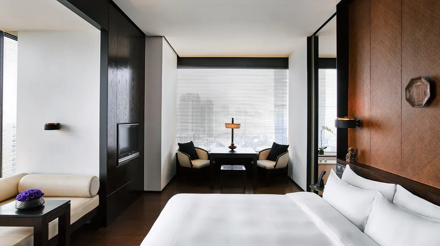 Elegant hotel room at The PuLi Hotel and Spa in Shanghai with stylish decor