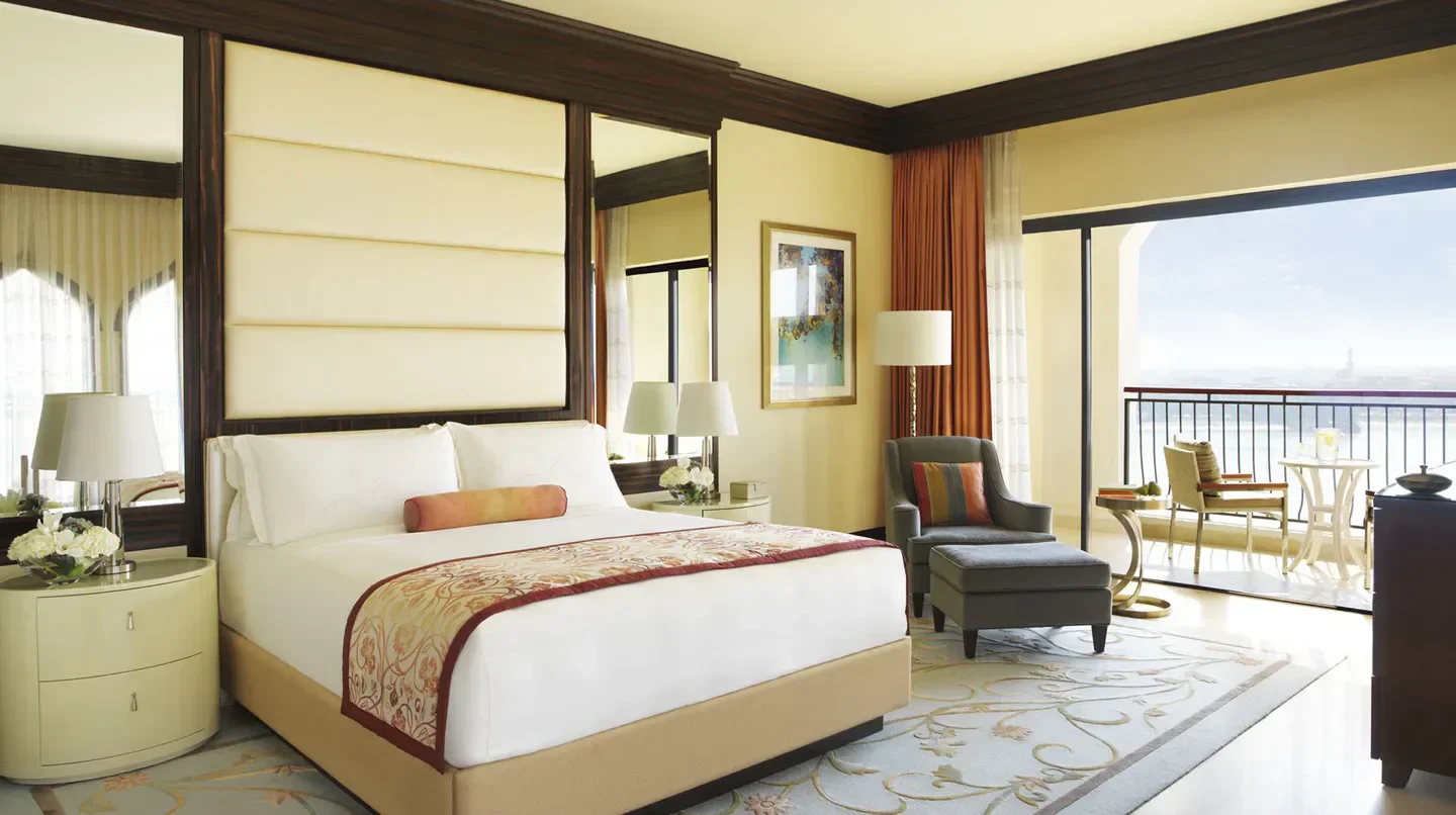 Elegant hotel room at The Ritz-Carlton Abu Dhabi, Grand Canal with balcony overlooking Abu Dhabi.
