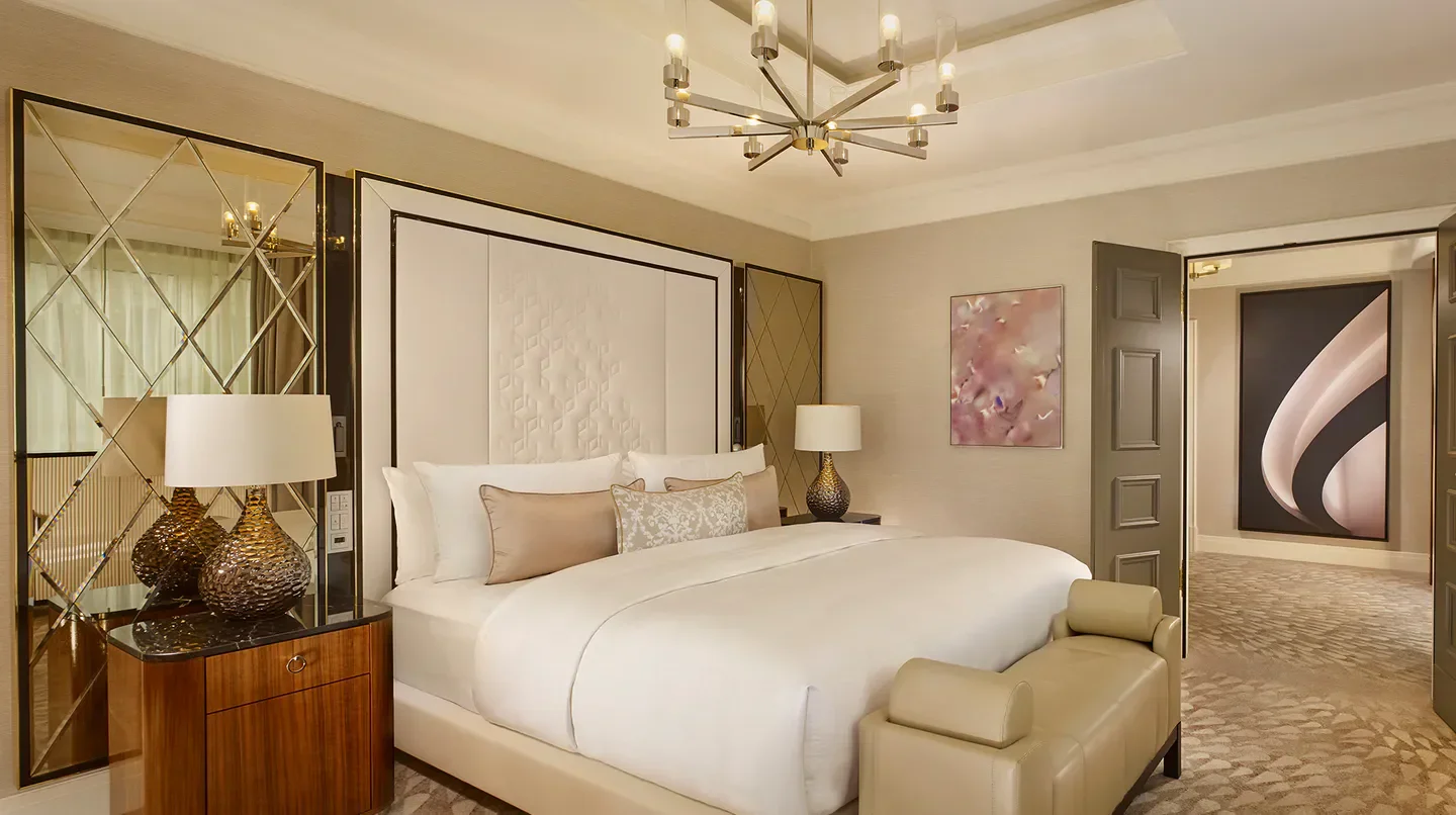 Luxury bedroom at The Ritz-Carlton, Berlin, featuring elegant design and comfortable ambiance in Berlin.