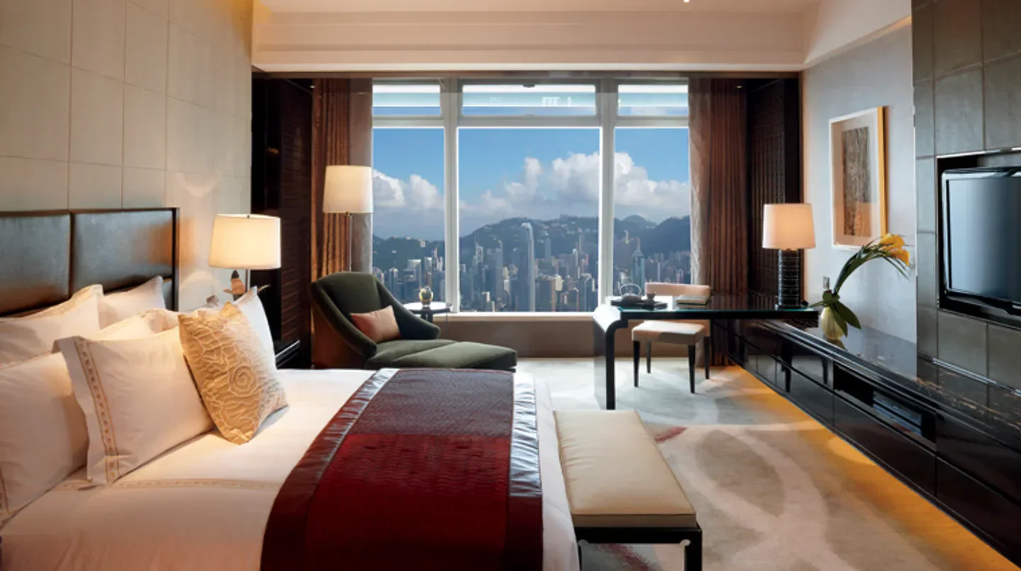Luxury hotel room at The Ritz-Carlton, Hong Kong with stunning Hong Kong city views.