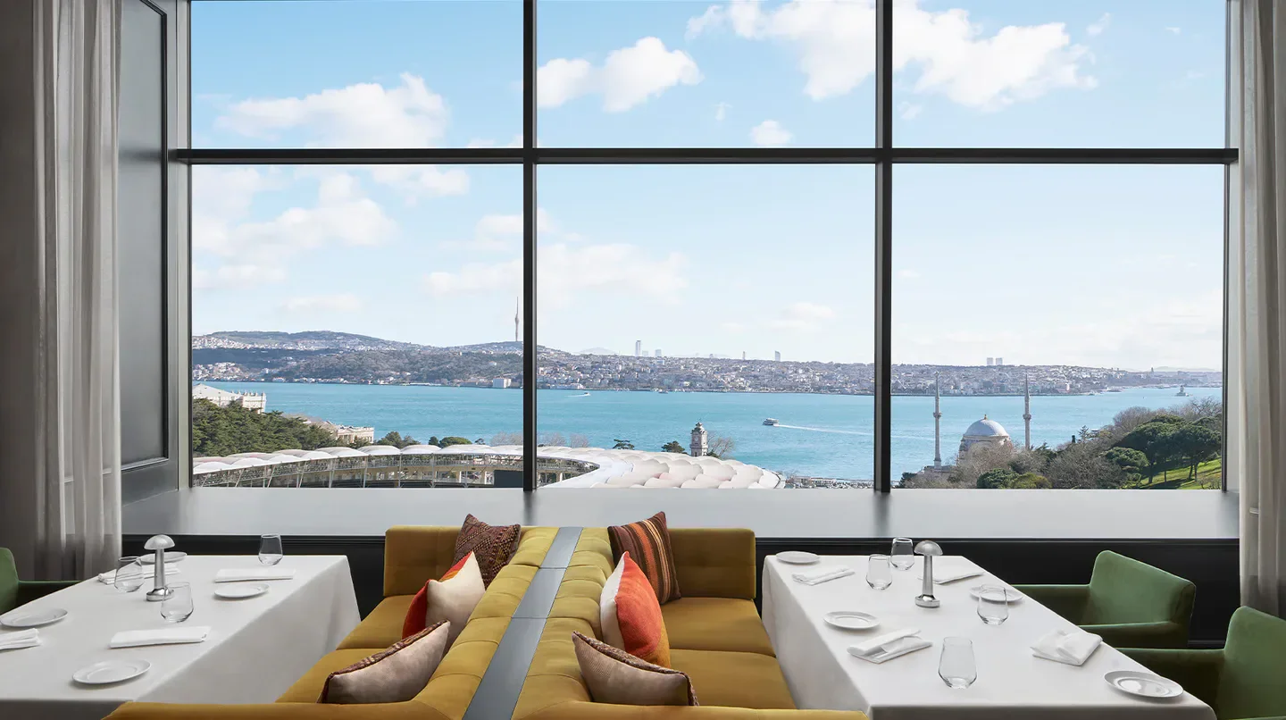 Dining area at The Ritz-Carlton, Istanbul, with stunning Istanbul waterfront views.